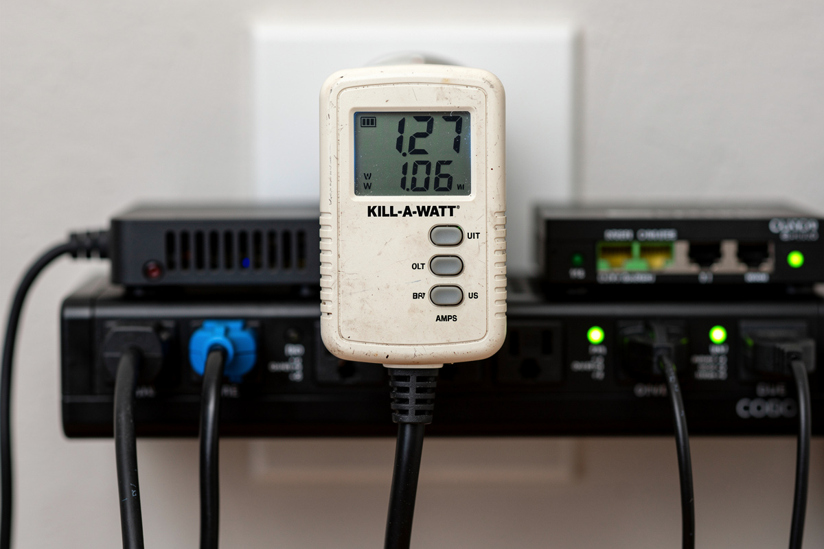 Kill-A-Watt meter measuring 127 watts of homelab equipment power draw