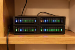 A four-bay NAS acting as a home server with drive activity lights