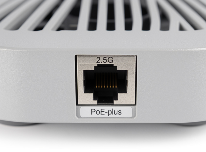 Close-up of a Wi-Fi 7 access point rear showing a 2.5G multi-gig ethernet port and PoE-plus label