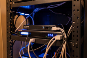 Homelab mini PC running Frigate NVR with a Google Coral USB accelerator plugged in